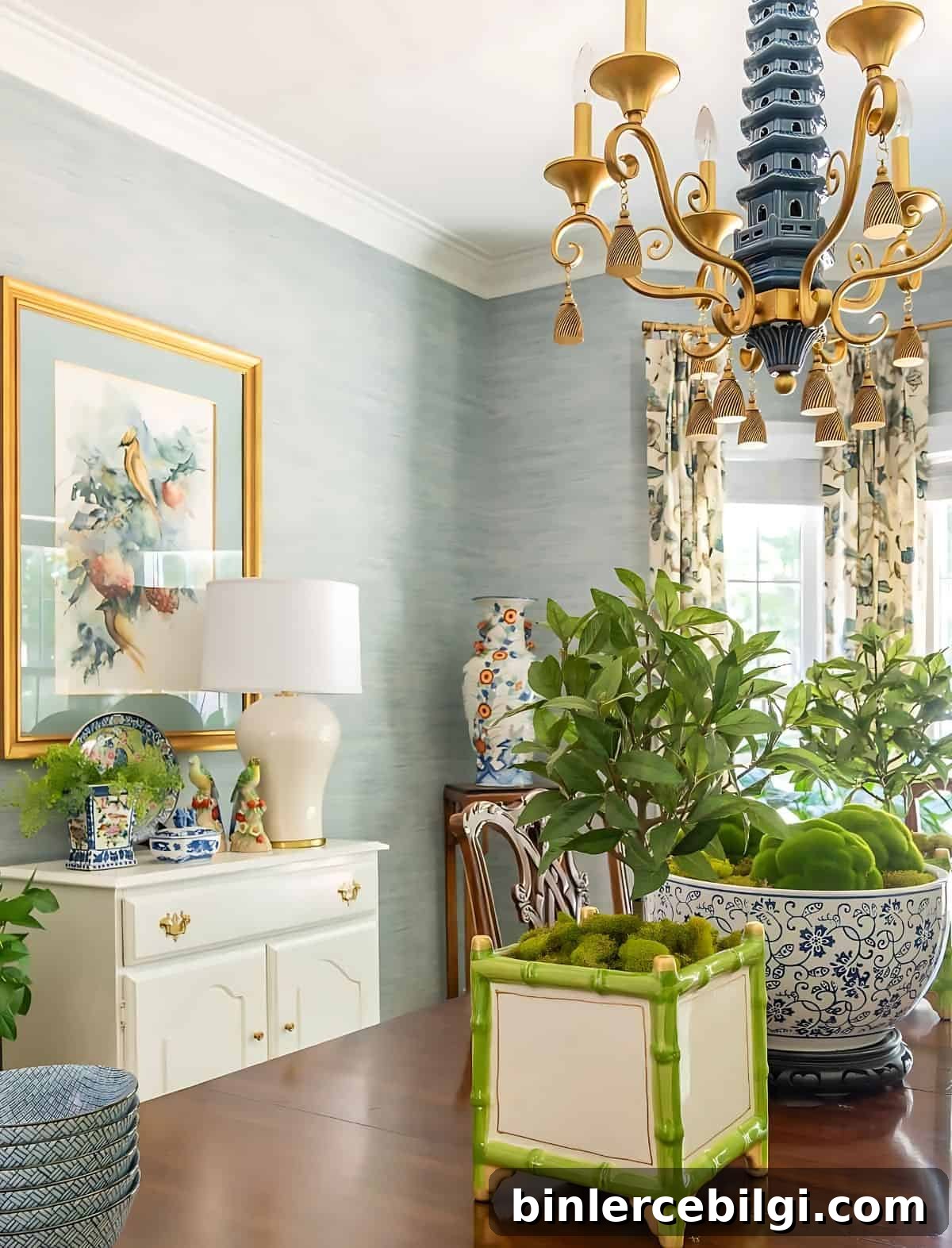 white buffet in the dining room with blue walls and traditional decor.