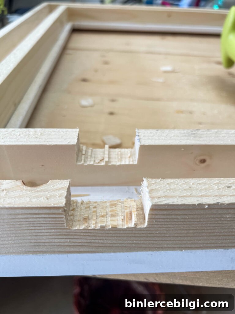 notched out board for the sensor for a Frame TV frame.