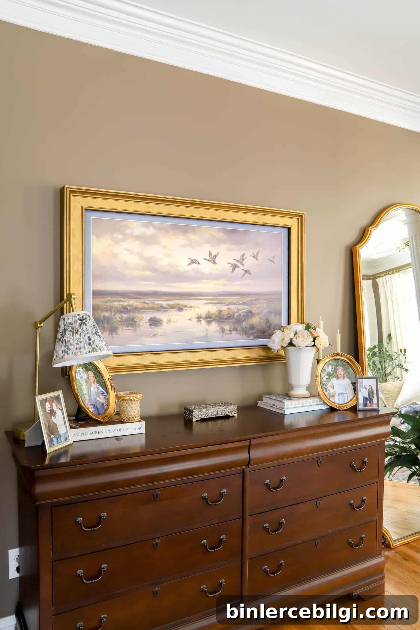 Frame TV on the bedroom wall