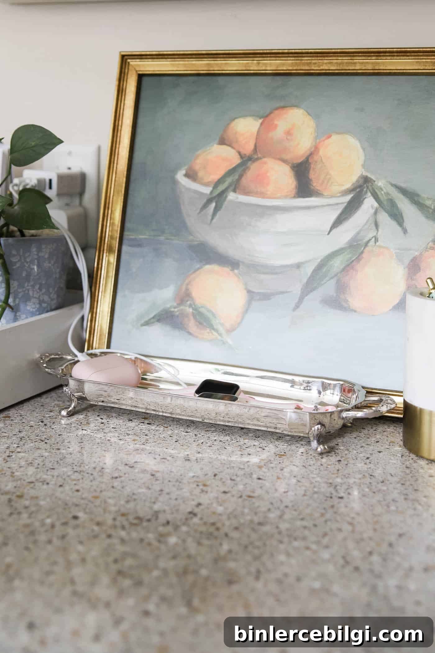 silver card tray used as an Apple Watch charging tray. 