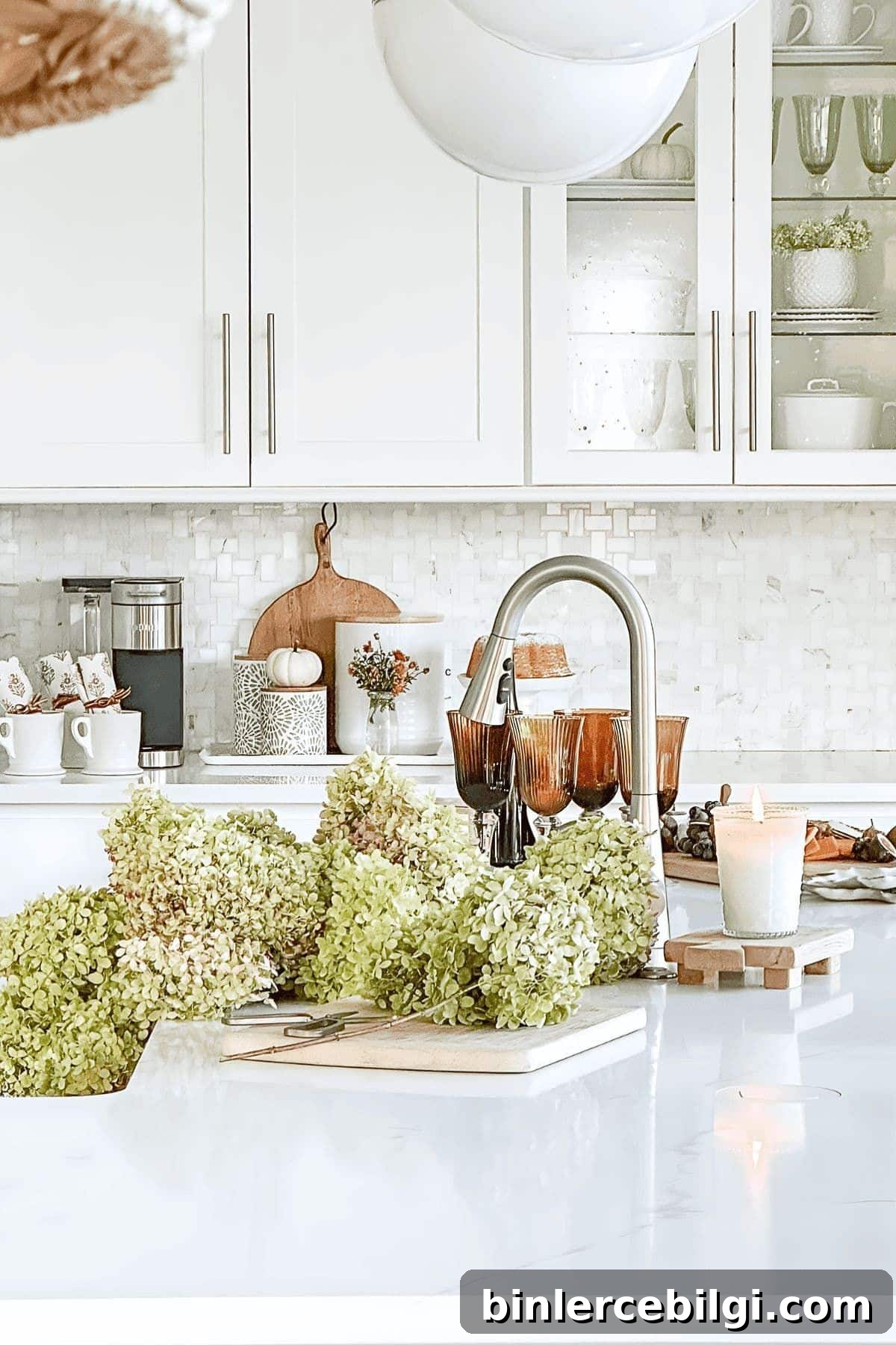 white kitchen with dried hydrangeas